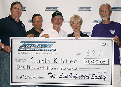 Top-Line Donation Check to Carol's Kitchen
